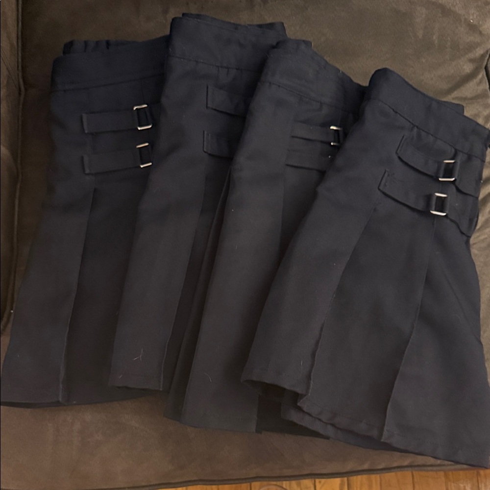 French Toast Navy uniform skirts with built in shorts.